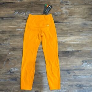 TLF size medium neon orange leggings NWT